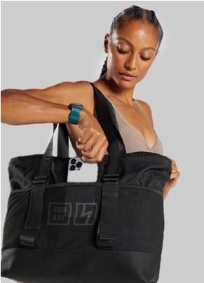 Sportkleding vrouw met tas